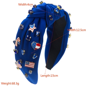 Navy blue knotted headband with USA flag star and heart rhinestone patriotic embellishments