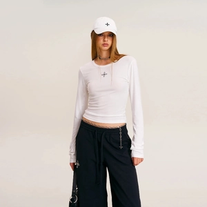 Streetwear look featuring a white cotton cap and t-shirt with black cross embroidery