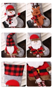 Detail of Christmas stocking ornaments featuring gnomes, reindeer and plaid patterns