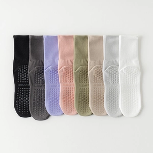 Non-slip yoga socks for women in eight colors featuring silicone grip pads for fitness