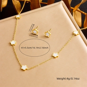Gold-plated stainless steel jewelry set featuring white shell floral necklace and earrings