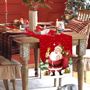 Christmas table runner with Santa Claus pattern on red background for festive dining decor