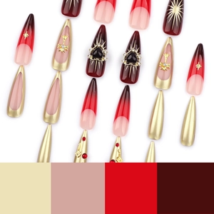 Red gradient stiletto press-on nails with gothic cross and 3D heart charms