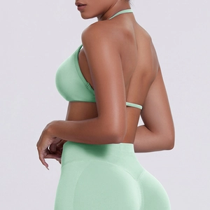 Side-rear view of mint green seamless ribbed sports set showing fabric texture and back detail