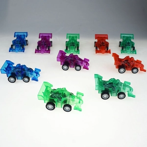 Detailed top view of nine colorful semi-transparent pull-back F1 racing toy cars for kids