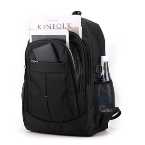 Detail view of large capacity black backpack showing laptop and water bottle storage