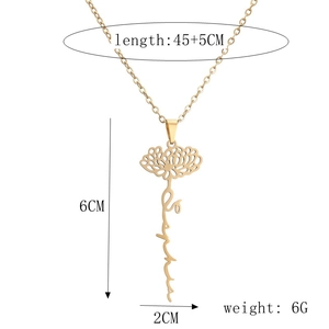 Detailed view of custom gold name necklace with lotus flower and Sophia pendant