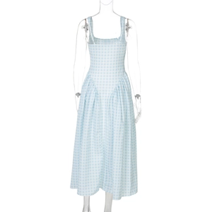 Detail of light blue and white plaid dress featuring A-line cut and waist slimming fit