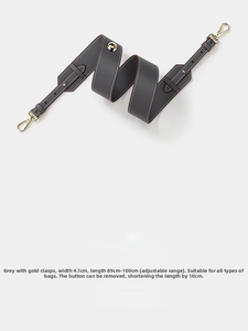 Grey leather wide shoulder strap detail with adjustable gold buckles and dimensions