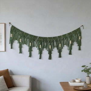 Handwoven forest green bohemian wall tapestry with geometric patterns and wooden beads