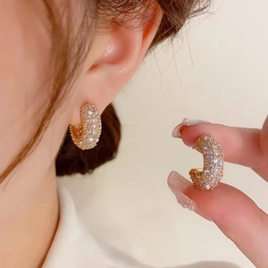 Sparkling pavé zircon C-shaped hoop earrings in gold plated finish for women