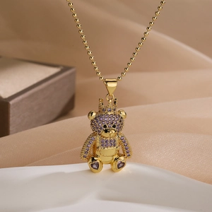 Collana a catena dorata con ciondolo orsetto corona incastonato di zirconi viola