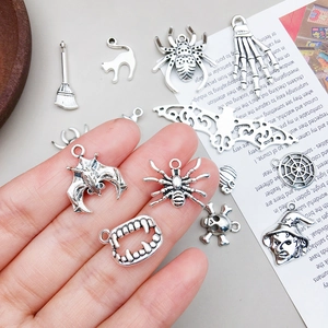 Assorted Halloween vintage silver alloy pendants including bat, spider and skull designs