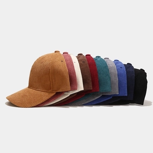 Classic corduroy baseball caps shown in a stacked multi-color selection for men and women