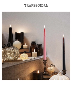 Halloween candle display with bleeding drip effect and glowing LED glass pumpkins