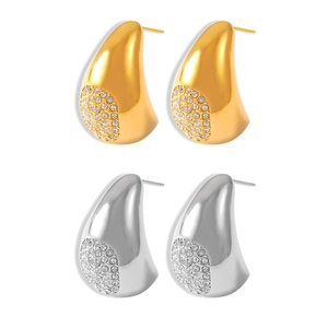 Boucles d'oreilles élégantes en forme de goutte d'or et d'argent avec zircons