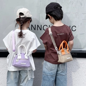 Kids mini two-tone crossbody handbags in purple and khaki with adjustable straps