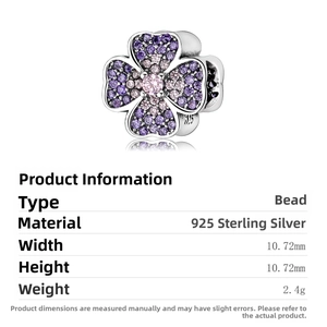 Macro view of S925 silver four-leaf clover charm with pink and purple zircon stones