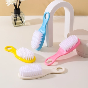 Set of 4 soft nylon bristle baby hair brushes in blue pink yellow and cream colors