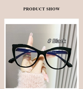 Handheld black cat eye glasses frames showing size 52-18-143 on inner temples