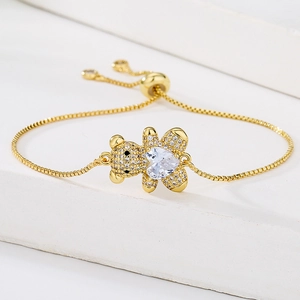 Adjustable gold bear bracelet with heart zircon and sparkling pavé crystal details