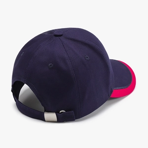 Navy blue baseball cap with pink underbrim and silver metal buckle from a rear view