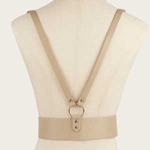 Detailed back view of a beige punk-style faux leather harness belt with silver metal ring