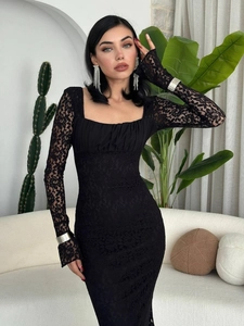Detail of square neckline with lace pattern on black slim fit long sleeve evening dress