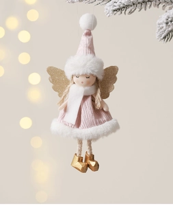 Detail of plush Christmas angel ornament with pink knit dress and sparkling gold wings