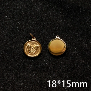 Detail of 18x15mm vintage gold butterfly round charms for DIY jewelry making