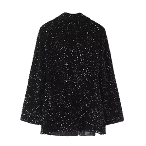 Detailed back view of a black sequin blazer featuring dense shimmering texture and long sleeves