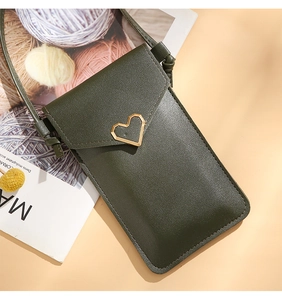Close-up of a dark green PU leather crossbody phone bag with a golden heart metal buckle