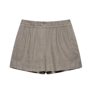 Detailed view of linen shorts featuring elastic high waist and dual button closure