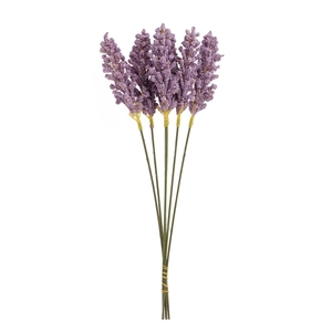 Detailed view of light purple artificial lavender bundles with green stems on white backdrop