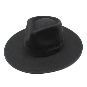 Classic black wool fedora hat with wide brim and decorative ribbon for autumn winter