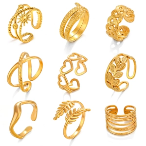 9-piece set of 18K gold plated stainless steel open rings with sun and heart designs