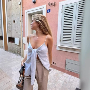 Sexy backless bandeau top with bow tie and khaki high-waisted casual trousers set