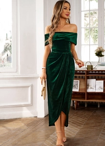 Elegant dark green velvet off-shoulder wrap dress paired with high heels and a clutch