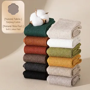 Women's premium Xinjiang cotton crew socks in earth tones with rib-knit texture