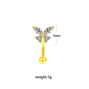 Detailed view of golden butterfly eyebrow ring with cubic zirconia inlay 6mm 1g