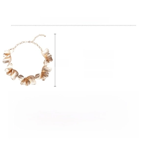 Detail of golden textured flower petal necklace with adjustable chain and alloy brushed finish
