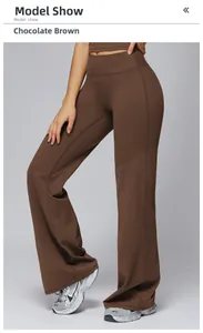 Detail show of high waisted chocolate brown flared yoga pants with slim fit elastic fabric