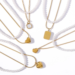Gold-tone stainless steel layered necklace set with heart and shell square pendants