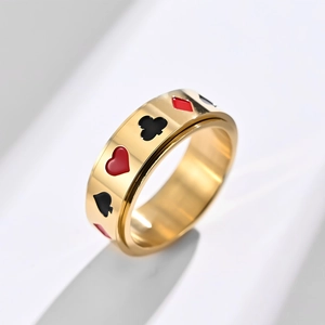 Gold spinner ring featuring colorful poker suit icons in polished stainless steel