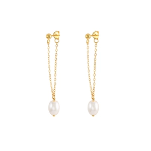 Macro detail of elegant gold tassel earrings with white oval pearls on white background