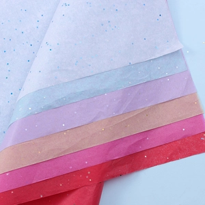 Detail of colorful translucent tissue paper with shimmering laser sequins for flower wrapping