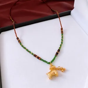 Tiger eye bead necklace with green glass and golden pony pendant in retro chinese style