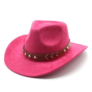 Hot pink faux suede cowboy hat with a brown studded leather band on white background