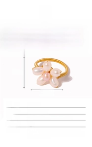 Detailed view of handmade flower ring with natural freshwater pearls and 18K gold plating