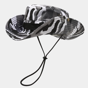Close-up of camouflage boonie hat with metal side buttons and adjustable wind cord